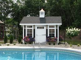 Garden sheds don't have to be basic, utilitarian structures. Victorian Cottage Photos The Barn Yard Great Country Garages Pool Shed Pool House Decor Small Pool Houses