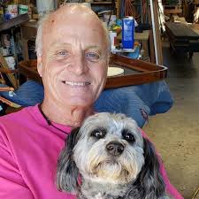 Man wearing pink every day in October, hosting Paddle the MarshWalk Pink