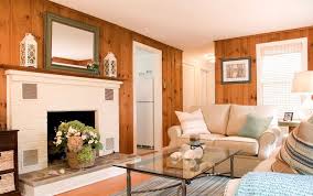 best pics fake white fireplace style remember when i was hemming and hawing about whether to pai knotty pine living room knotty pine paneling knotty pine walls
