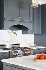 Brass Hardware Kichen With Brass Hardware Navy Grey Kitchen Cabinets With Brass Cabinet Hardware The Brass C Kitchen Colors Kitchen Remodel Kitchen Cabinets