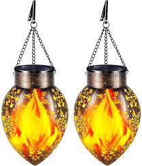 Cotta tin urethane vinyl wicker wood wood fibers ceiling hanging countertop floor ground freestanding multiple locations railing tabletop wall window large (16 and up). Buy Tomcare Solar Lights Outdoor Metal Flickering Flame Solar Lantern Outdoor Hanging Decorative Lanterns With Hanging Chain Solar Powered Waterproof Led Decorations For Patio Garden Deck Yard 2 Pack Online In Italy