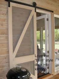 Sliding Barn Door And Its A Screen Genius Would Love To Do This On A Screened In Back Porch Barn Style Doors House Home