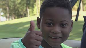 Young Arkansas boy lights up golf course months after life-saving heart  surgery