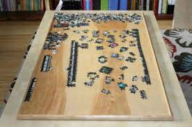 Calling all jigsaw puzzle lovers, who need the puzzle coffee table build plans and the story behind the now selling jigsaw puzzle table. 15 Diy Puzzle Boards Ideas How To Make A Puzzle Board