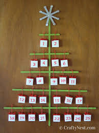 This lamp is a representation of a. Diy Craft Stick Christmas Tree Advent Calendar With Origami Boxes Crafty Nest