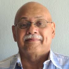 It is with heavy hearts that we share the passing of Ralph Manon, lovingly  known to many as Mr. Manon—a beloved educator, librarian, tutor, and a  guiding parent figure to countless students.