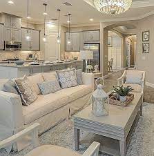 Create some up to date cool by keeping the scene straightforward with pale grey walls and let the create a relaxing yellow and grey lounge with a cool colour combination and whimsical floral patterns. Contemporary Cream And Grey Living Room Ideas Novocom Top