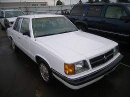 1989 White Dodge Aries This Is An Example Of My First Car Given To Me By My Parents First Car Cool Cars Cars