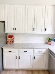 The primary function of cabinet hardware is to allow you to open your cabinet doors and drawers. White Kitchen Cabinet With Black Hardware Novocom Top