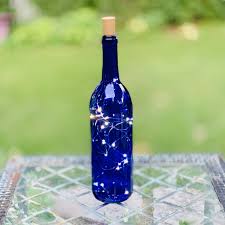 Is it genuine that you are gone to a social occasion and need to give something unique and unexpected to the hosts? Blue Bordeaux Empty Wine Bottle With Twinkle Fairy Lights Powered From The Cork Wine Bottle Decor With Lights Wine Bottle Crafts Centerpieces Buy Online In Bahamas At Bahamas Desertcart Com Productid 57080303