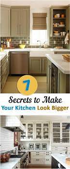 7 Secrets To Make Your Kitchen Look Bigger Cheap Kitchen Cabinets Kitchen Remodel New Kitchen Cabinets