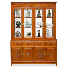 A designer rosewood display cabinet with a classic architectural silhouette worked in solid rosewood with bold, crisp and highly decorative balls. Natural Rosewood Longevity China Cabinet