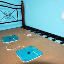 Piezoelectric sensors placed under the mattress