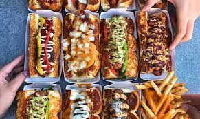 A doghouse, dog house, dogshed or kennel is a small shed commonly built in the shape of a house, intended to provide dogs with a sense of security and protection from various weather conditions. Dog Haus Announces Grand Opening Date For New Tempe Location