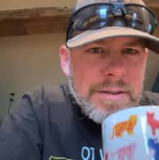 Photo of animals including dogs and aoudad