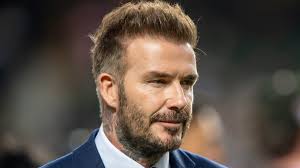 David Beckham and family join mourners at Man Utd legend Kath Phipps'  funeral
