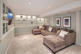 Transitional Basement With Carpet Built In Bookshelf Chair Rail Columns High Ceiling Bookshelves Built In Lounge Chairs Living Room Home