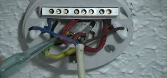 Wiring 2 x 2 way switches together and also to the ceiling rose. How To Swap An Old Ceiling Rose With A Modern Light Fixture Plumbing Electric Wonderhowto