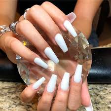 These simple white ombre french tip coffin nails are perfect if you like a clean look. White Coffin Nails