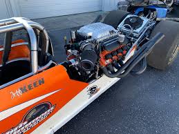 Dragster c goes further than dragster b due to the larger circumference of the bigger tires, and even though axle speed is the same. These Guys Dropped A Dodge Hellcat Engine Into A Dragster