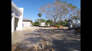 Use the steel rake to ensure that the material is even across the surface. Shell Oysters Installation On Concrete Driveway Youtube