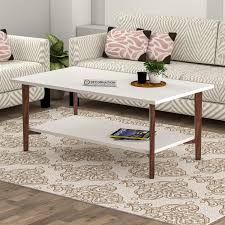 Classic moldings and plenty of shelf space make this coffee table a smart choice for transitional interiors. Ripon Wooden Coffee Table With Storage White Decornation