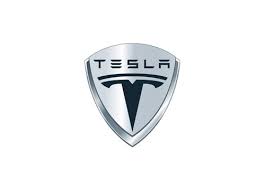 The stylized letter t appears on the front grille of the model s, leaving no doubt as to what the manufacturer of this car is. Tesla Logo Tesla Emblem Tesla Symbol