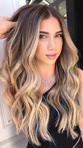 The wavy hairstyle is suitable for the woman with a voluminous. Gorgeous Hair Colors That Will Really Make You Look Younger