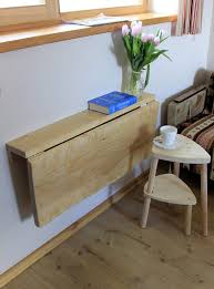 This Handmade Wall Mounted Table Made Of Birch Tree A Real Disaster For People Wall Mounted Table Space Saving Table Diy Space Saving