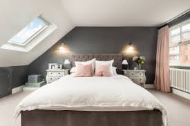 Sophisticated primary bedroom boasts a white coffered ceiling and pink full wainscoted accent wall decorated with gold gallery frames. 75 Beautiful Grey And Pink Bedroom Ideas Designs May 2021 Houzz Uk
