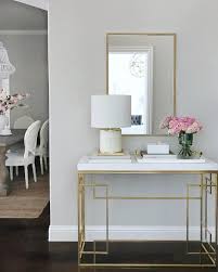 40 Eye Catching Entry Table Ideas To Make A Fantastic First Impression Modern Entry Table White Entry Table Entryway Table Decor