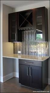 This Wine Rack Butler S Pantry Is Packed With Custom Details Espresso Cabinetry Glass Cabinet D Dark Kitchen Cabinets Kitchen Design Trends Glass Pantry Door