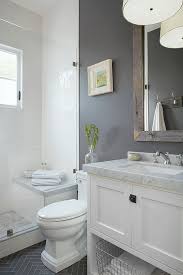 Small Grey White Bathroom Love The Bench In The Shower And The Contrasting Colors Bathroom Design Small Bathroom Remodel Master Small Master Bathroom