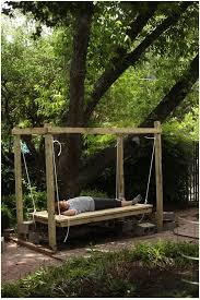 Try this diy hanging hammock chair on for size! How To Build A Hanging Bed Easy Diy Outdoor Swing Bed To Complete Your Backyard Goals Outdoor Bed Swing Outdoor Beds Diy Porch Swing Bed