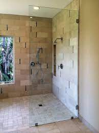 Frameless Glass Screen For Shower Another Doorless Solution This Splash Panel Stops Short Of The Tall Ceiling And Is Shower Remodel Glass Shower Shower Doors