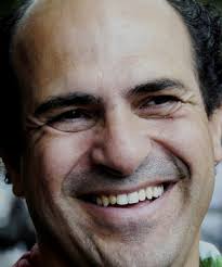 Image of ROMANIAN ROMA KING FLORIN CIOABA LAUGHS DURING A TV TALK