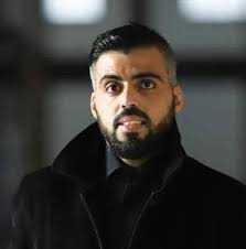 Palestinian journalist Islam Al-Koumi and his son were killed in an Israeli  strike