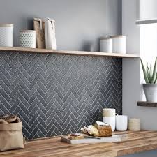 An even simpler diy kitchen backsplash idea is to cut larger sheets of patterned vinyl based on the size of your backsplash and cover the backsplash area like wallpaper. Herringbone Kitchen Backsplash For Diy Decor Part 7 Shairoom Com Modern Kitchen Backsplash Kitchen Tiles Backsplash Kitchen Backsplash Designs