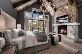 The great room consists of a huge open space that's perfect for large family gatherings. Breathtaking Mountain Modern Home In Montana With Inviting Details Rustic Bedroom Design Luxurious Bedrooms Home Bedroom