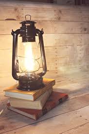 Our Re Imagined Lantern Light Offers The Cozy Feel Of The Outdoors In A Versatile Lamp For Your Kitchen Living Room Our Electric Lanterns Lantern Lights Lamp