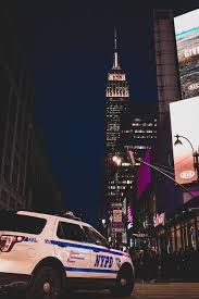 Hd Wallpaper White And Blue Nypd Ford Explorer Police Cruiser On Road With View Of Empire State Building During Night Time Wallpaper Flare Tons of awesome police wallpapers to download for free. blue nypd ford explorer police cruiser