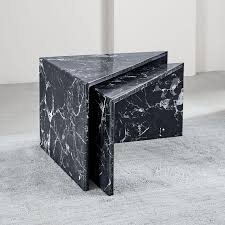 For more compact spaces, choose from our range of stylish nests. Triangular Black Marble Nesting Side Tables