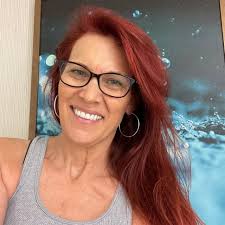 Kristi Noem's awful MAGA hair extensions are a tangled mess of desperation,  held together with blind loyalty and cheap adhesive.