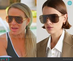 Heather's gold frame sunglasses