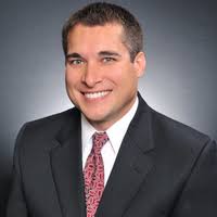 MARK STUART ACHUFF, Owner