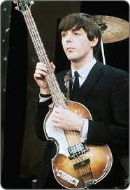 He picked up the instrument in 1961. Paulmccartney Photographed In February 1964 With His 1962 63 Hofner 500 1 Left Handed Bass Bassguitar Hofner Vo The Beatles Beatles Guitar Paul Mccartney
