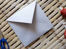 Make your own storage envelopes for your scrapbook pages. How To Make Your Own Paper Envelope