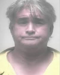 Alleged bank robbery suspect who signed own name to note arrested