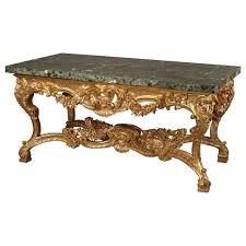 The coffee table is no longer a surface to solely put down your hot beverage, to kick up your feet, or to place a glass of wine. Italian Carved Giltwood Centre Table With A Verde Antico Marble Top Circa 1860 For Sale At 1stdibs
