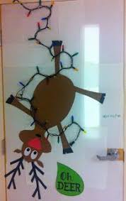 Dial down the scary door decorations and make pumpkins the theme. Merry Christmas Christmas Door Decorations Christmas Classroom Office Christmas Decorations
